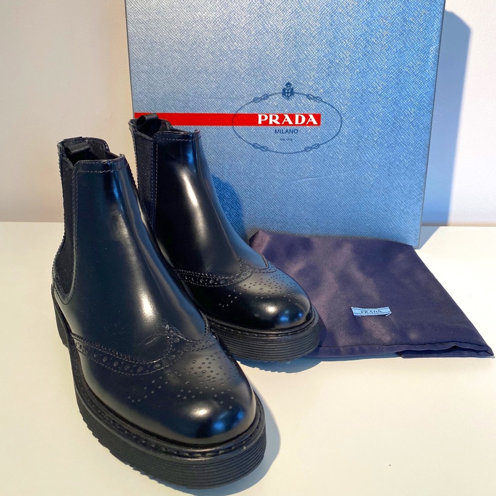 Prada Spazzolato Wing Tip Chelsea Boots